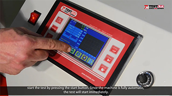 Starting the test with the concrete compression test machine